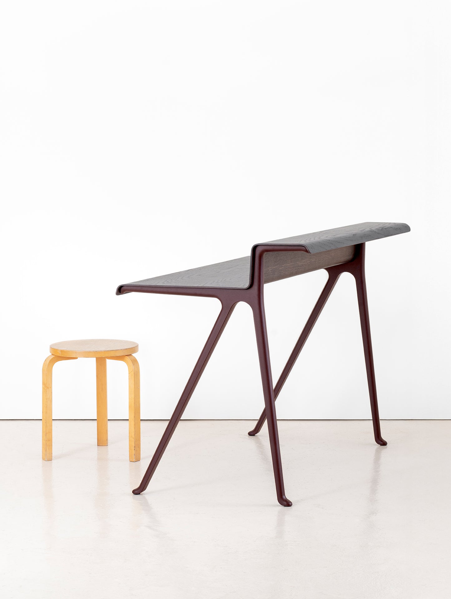 Courier Desk by Vitra - Dark Oak Veneer / Dark Bordeaux Aluminium Base
