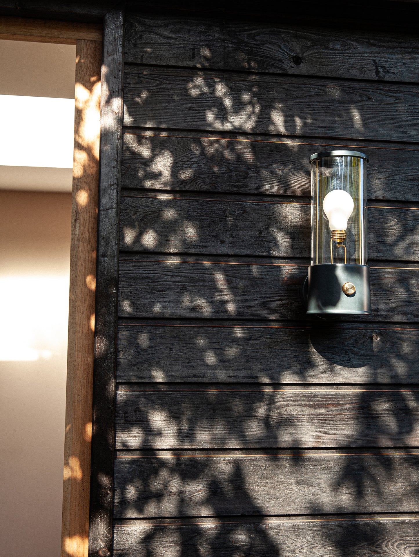 The Muse Wall Lamp by Tala - Hackles (Blue Black)