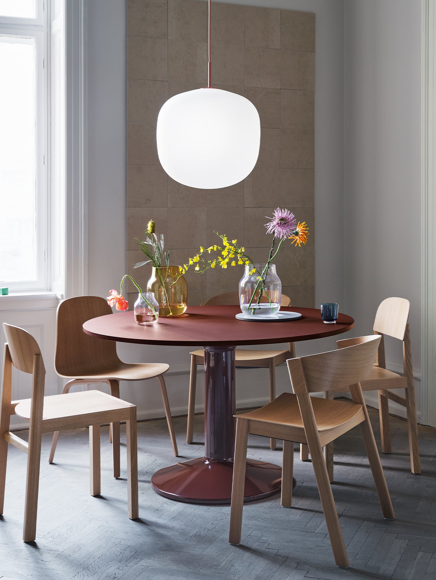 Midst Table by Muuto - Diameter: 120 cm / Dark Red Linoleum Tabletop with Dark Red Steel Base