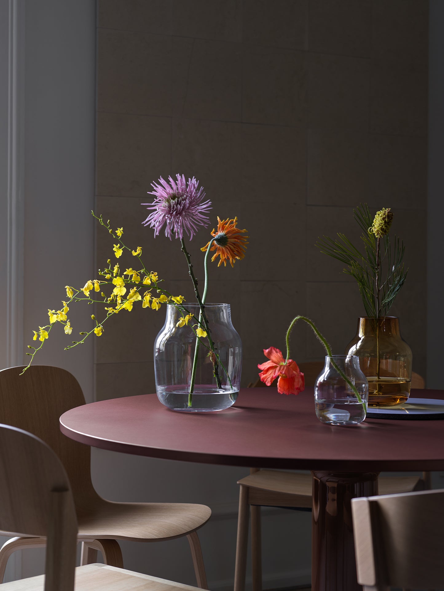 Midst Table by Muuto - Diameter: 120 cm / Dark Red Linoleum Tabletop with Dark Red Steel Base