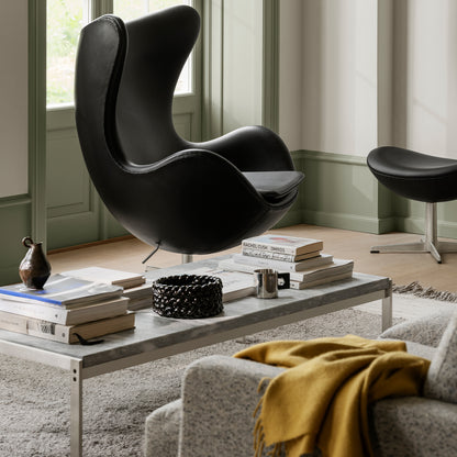 Egg Footstool by Fritz Hansen - Black Grace Leather