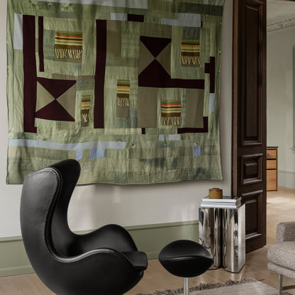 Egg Footstool by Fritz Hansen - Black Grace Leather