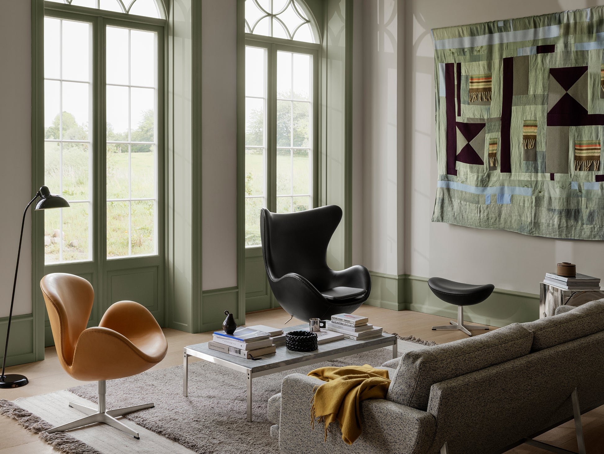 Egg Footstool by Fritz Hansen - Black Grace Leather