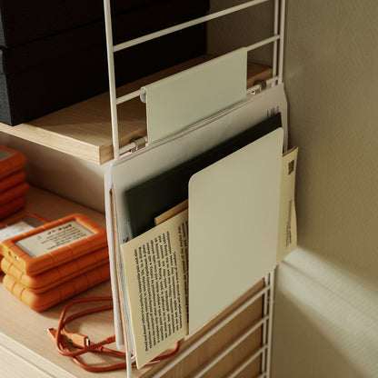 String Magazine Holder