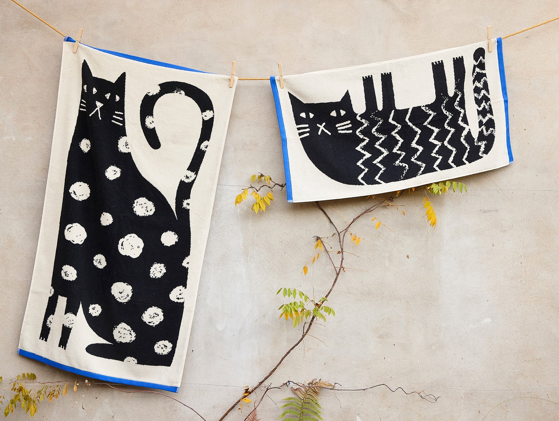 Lazy Cat Towels by Donna Wilson