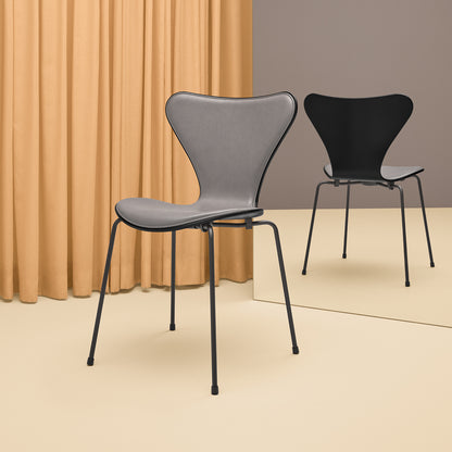 Series 7™ 3107 Dining Chair (Front Upholstered) by Fritz Hansen - Front: Essential Lava Leather / Back: Black Lacquered Veneer