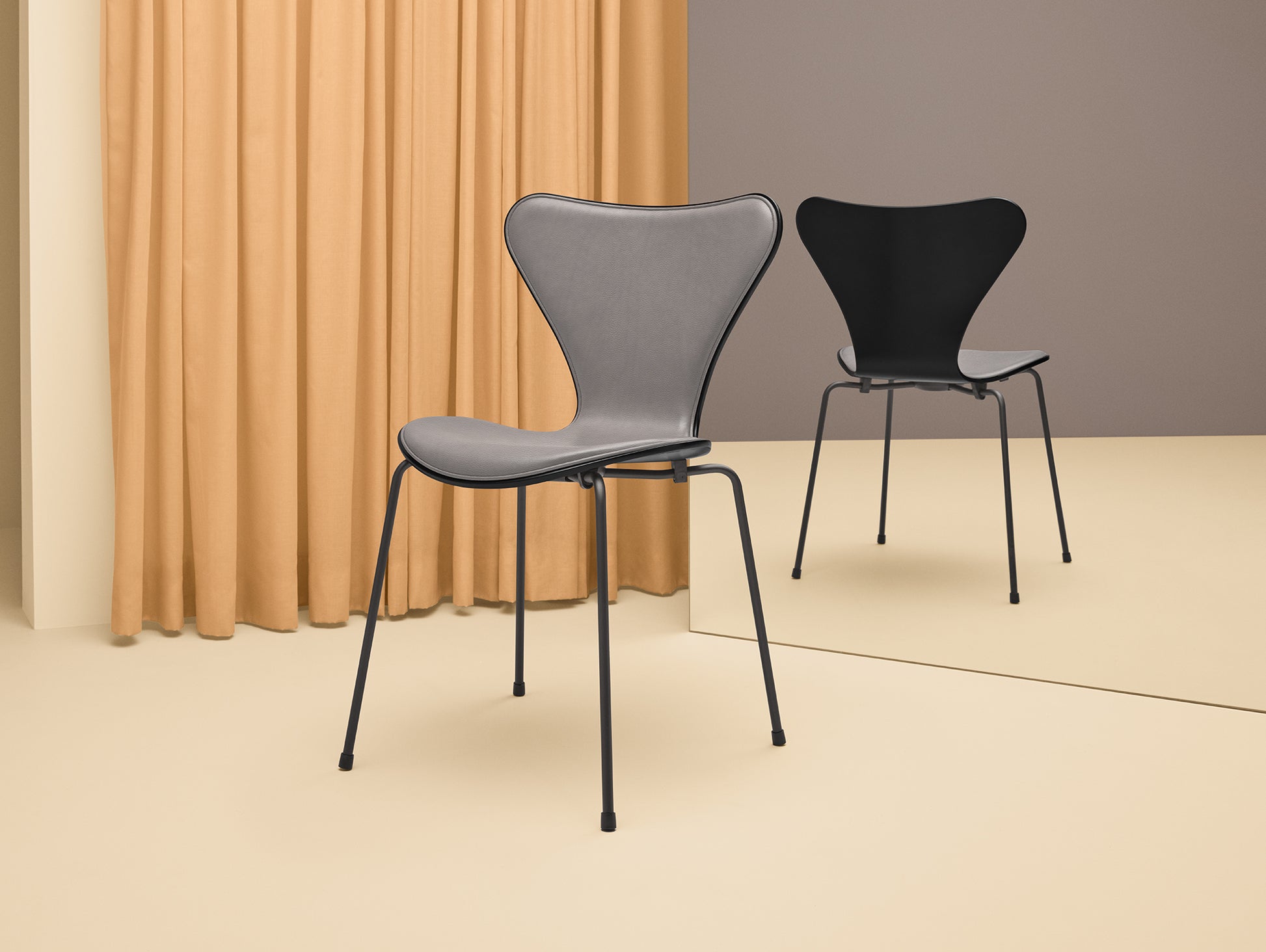 Series 7™ 3107 Dining Chair (Front Upholstered) by Fritz Hansen - Front: Essential Lava Leather / Back: Black Lacquered Veneer